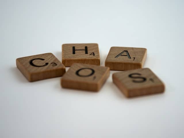 Wooden Scrabble tiles spelling "HOST" on a white background, symbolising website hosting issues.